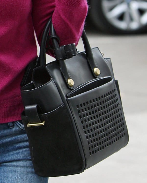 Reese Witherspoon carrying a Reed Krakoff "Atlantique Bionic" tote