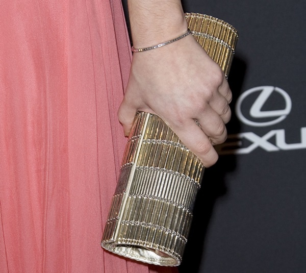 Sarah Hyland toting an ITA Collection clutch