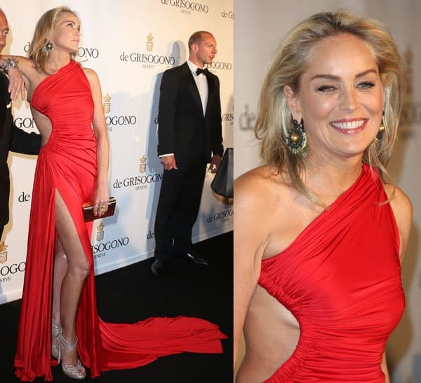 Sharon Stone commands attention in a bold, one-shoulder red gown with daring cutouts and a thigh-high slit, showcasing her ageless beauty and confidence at the de Grisogono party during the Cannes Film Festival