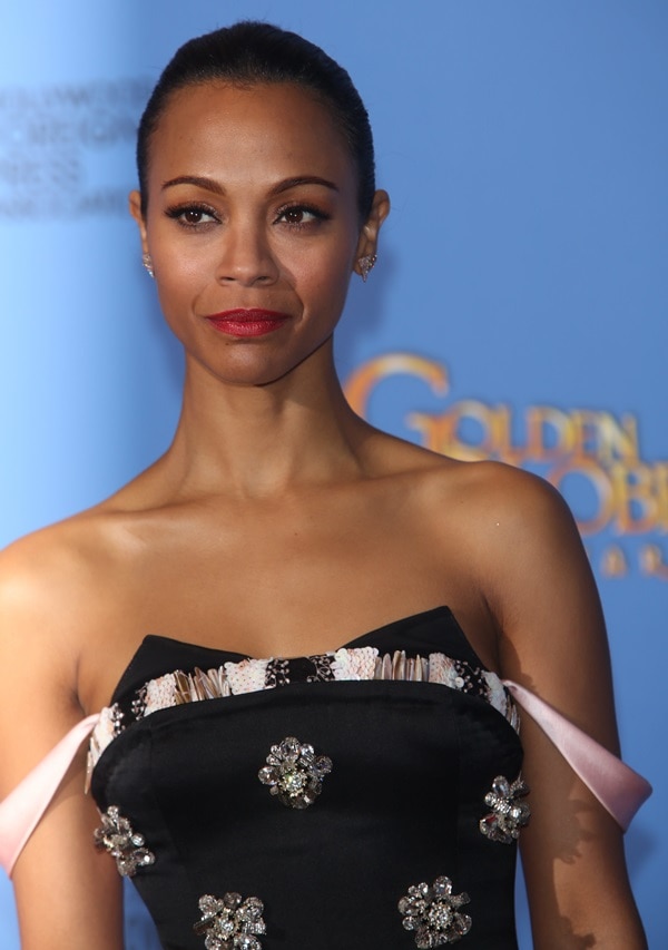 Zoe Saldaña in a strapless cocktail dress