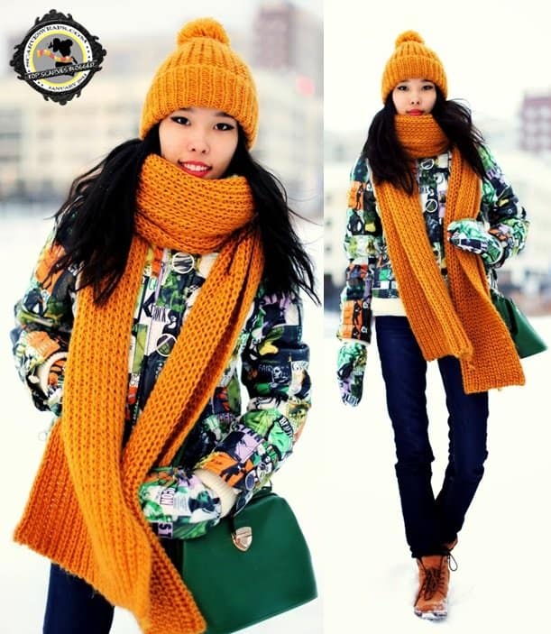 Aibina added solid shots of orange to her outfit