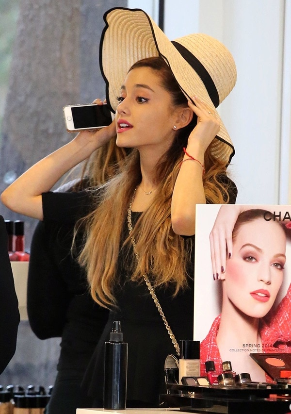 Ariana Grande wearing her hair in a high ponytail while shopping in Los Angeles