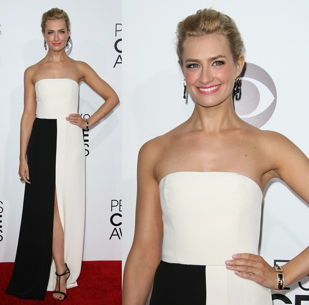 Beth Behrs opts for sleek minimalism in a black-and-white Giulietta column gown paired with crystal-embellished René Caovilla sandals at the 2014 People’s Choice Awards