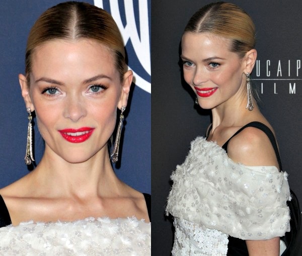 Close-up of Jaime King at the 2014 Golden Globes after-party wearing a white Prabal Gurung dress with floral appliqué and crystal embellishments, paired with statement earrings and a sleek bun