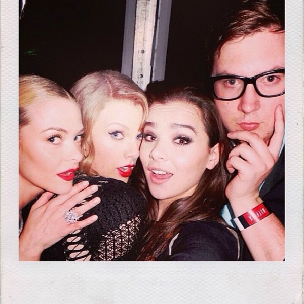 Jaime King, Taylor Swift, Hailee Steinfeld, and photographer Justin Campbell pose playfully