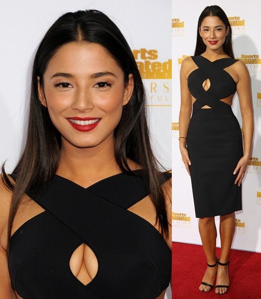 Jessica Gomes makes a sleek red-carpet statement in a cutout black dress, grounding the modern silhouette with minimalist black ankle-strap sandals