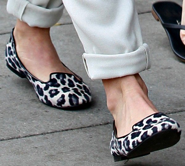Julianne Hough adds a playful twist to her neutral outfit with Ann Taylor’s “Hadley” leopard-print suede loafers, proving that patterned flats can instantly elevate a relaxed daytime look