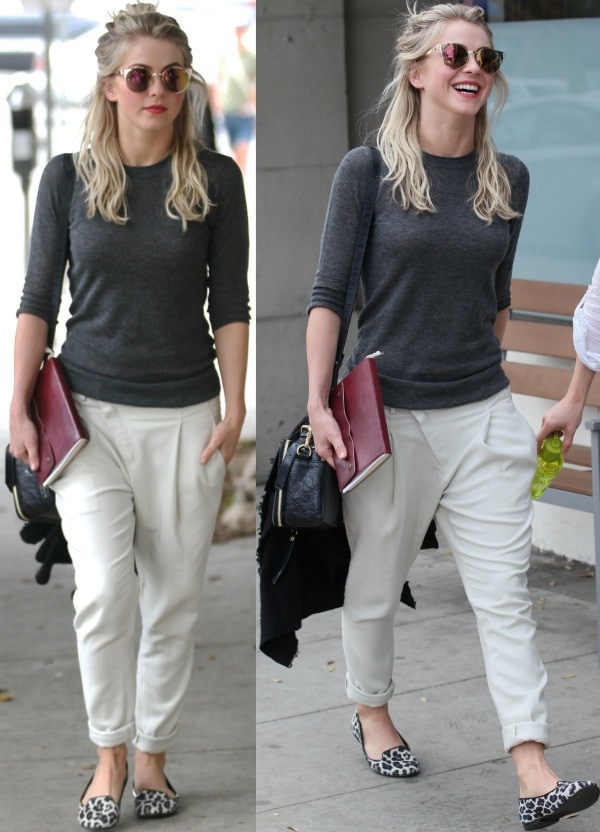 Julianne Hough exudes relaxed sophistication in a fitted charcoal sweater, ivory Helmut Lang pleated pants, and Ann Taylor leopard-print loafers while out shopping in West Hollywood on January 21, 2014