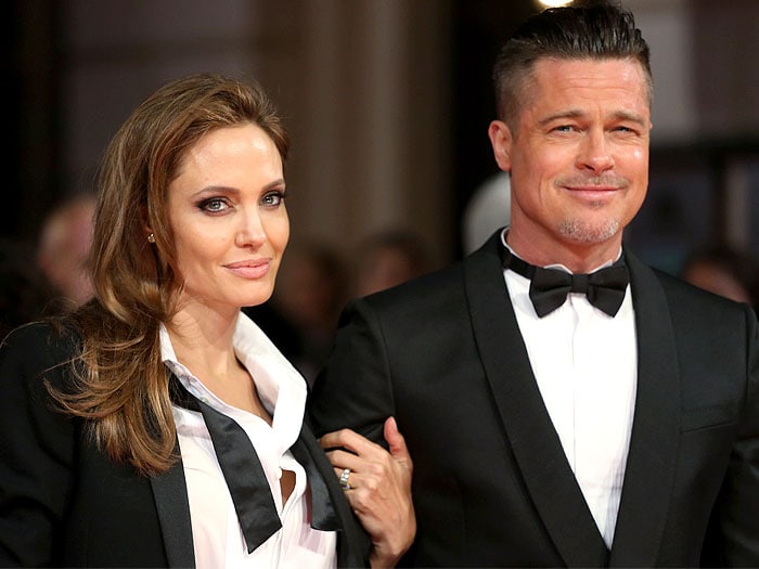 Angelina Jolie and Brad Pitt brought to mind their iconic roles in Mr. and Mrs. Smith