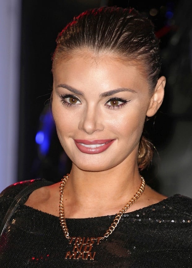 Chloe Sims shows off her "Trust No Man" necklace from Holly Hagan