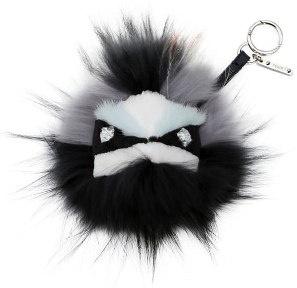 Fendi Crystal-Eyed Fur Monster Bag Charm featuring spiky black-and-white fur, faceted crystal eyes, and a silver-tone keyring — a playful luxury accessory from the brand’s iconic Bag Bugs collection