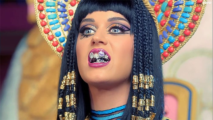 Katy Perry stuns with bold Egyptian-inspired makeup and a blinged-out grill