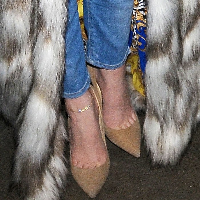 Khloé Kardashian's feet in suede "Anouk" pumps