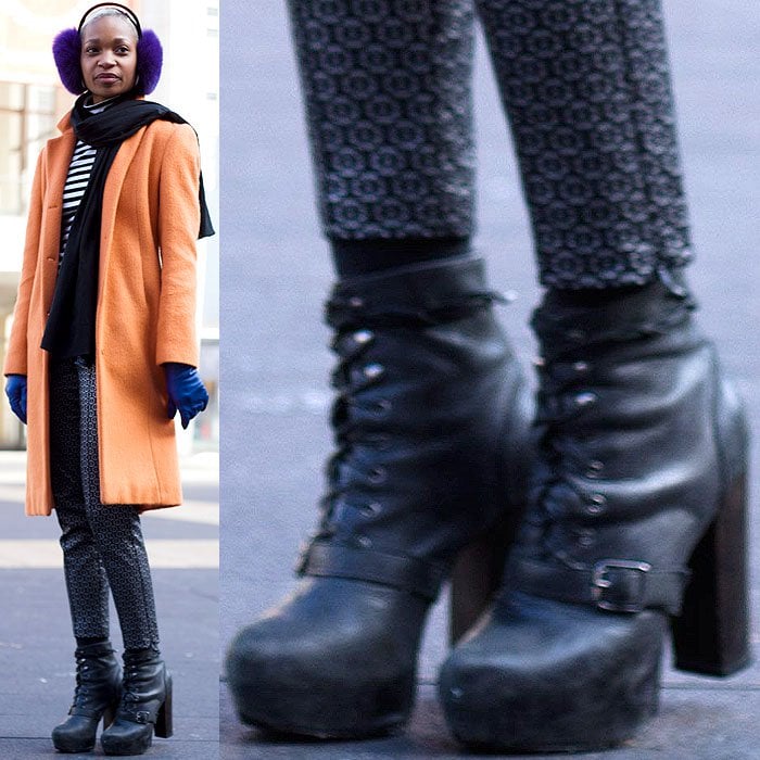 Model wears an orange coat, blue gloves, and purple earmuffs