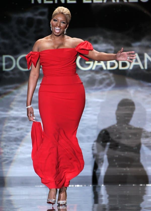 Known for her larger-than-life personality, NeNe Leakes brought commanding confidence to the runway in a Dolce Gabbana gown and a pair of stunning silver studded heels