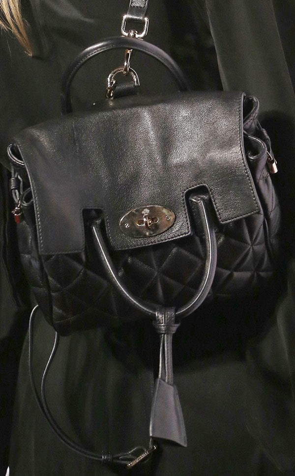 Cara Delevingne showcased her quilted black Nappa leather Mulberry bag, finished with a structured top handle and signature postman’s lock, as the standout accessory of her 2014 Elle Style Awards look
