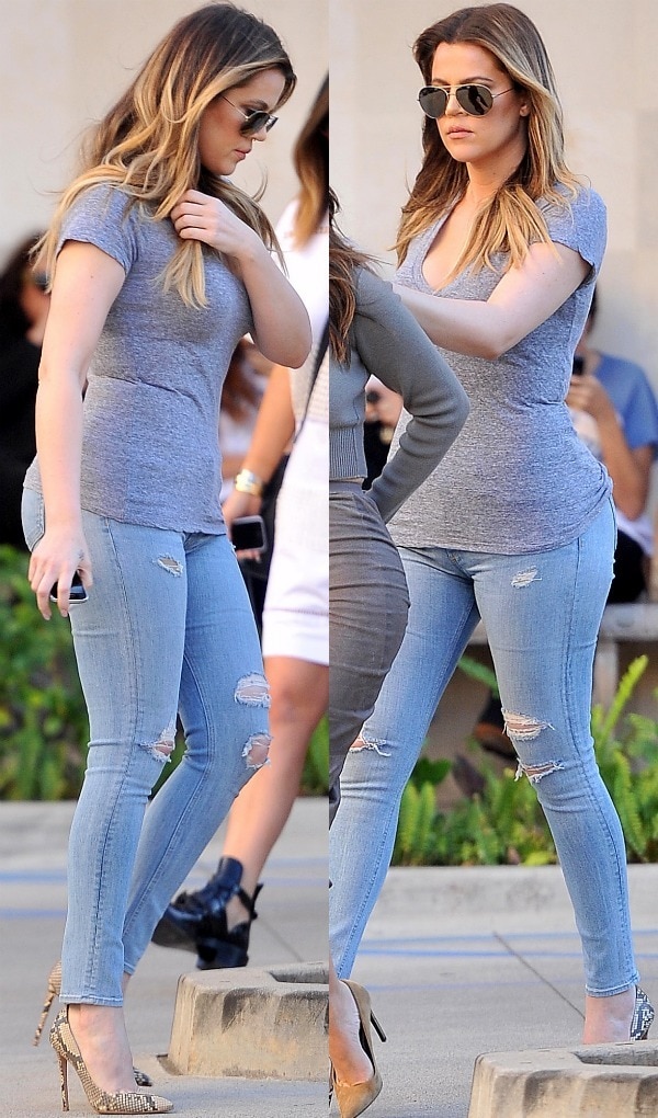 Khloé Kardashian paired a fitted gray tee and distressed skinny jeans with pointed python pumps, adding a polished finish to her casual daytime outfit