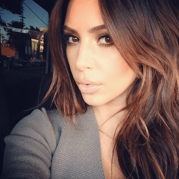 Kim Kardashian debuted her return to brunette hair on Instagram ahead of a Los Angeles outing that showcased one of her signature Saint Laurent pump looks