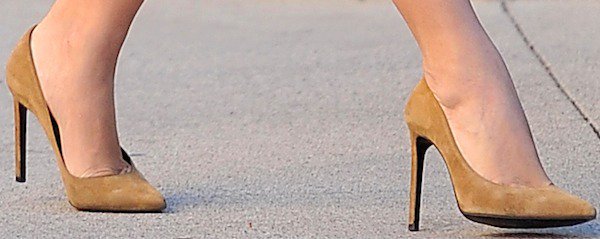 Kim Kardashian's tan suede Saint Laurent "Paris 105" pumps completed her monochromatic look with the sleek pointed-toe silhouette that defined Hedi Slimane's era at the house