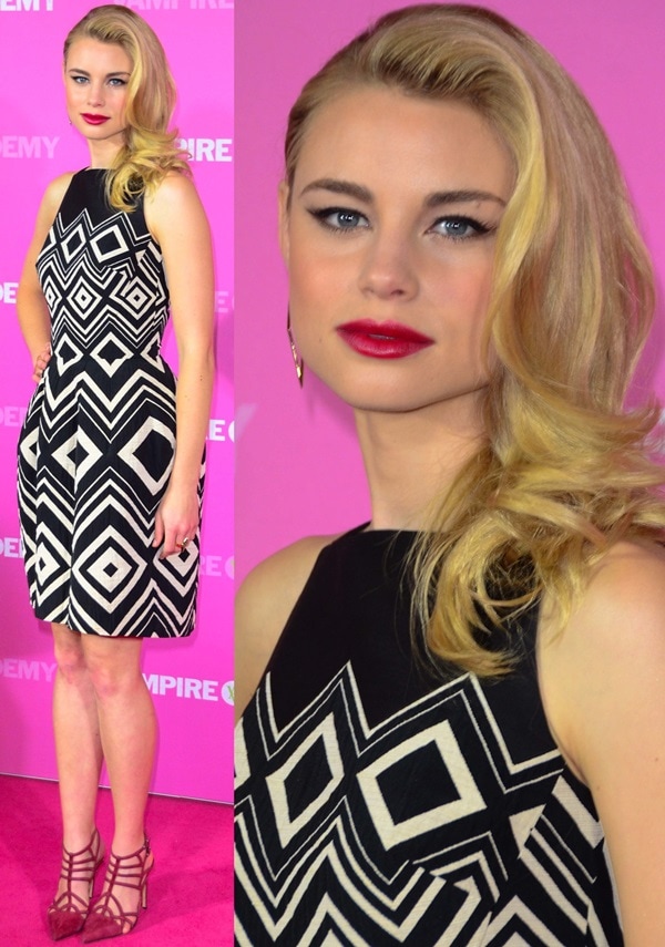 Lucy Fry’s graphic monochrome sheath is sharpened by strappy pointed-toe heels that echo the dress’s geometric lines