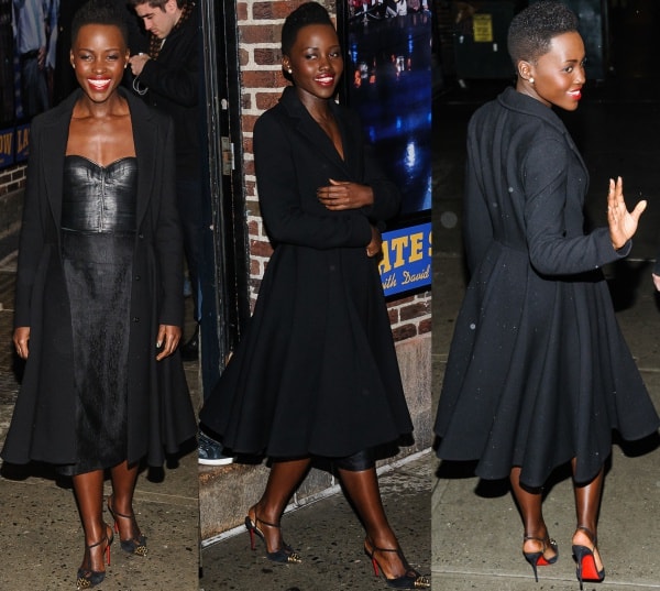Lupita Nyong’o leaves the Ed Sullivan Theater in New York City on February 19, 2014, after her Late Show with David Letterman appearance, stunning in a strapless J. Mendel dress with a leather basque, a flowing black coat, and Christian Louboutin “Geotistrap” slingback pumps