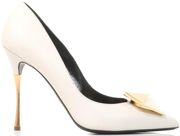 White leather Nicholas Kirkwood “Hexagon” pumps featuring sharp pointed toes, a sculptural gold heel, and geometric resin detailing that adds architectural edge to an otherwise minimalist silhouette