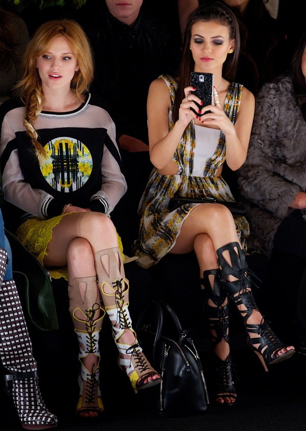 Victoria Justice and Bella Thorne sitting in the front row at the Rebecca Minkoff fashion show during Mercedes Benz Fashion Week