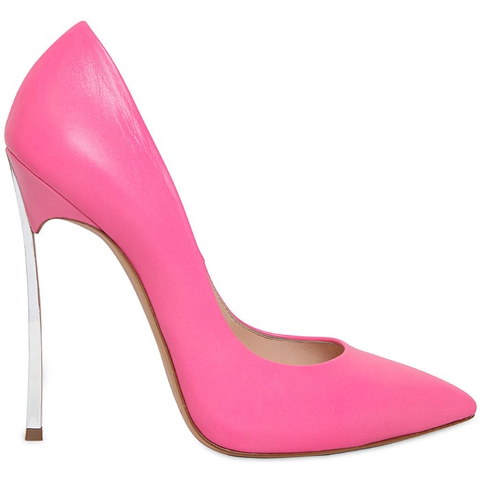A signature Casadei blade-heel pump in vibrant bubblegum pink, finished with a razor-thin metal stiletto that delivers instant polish and leg-lengthening drama