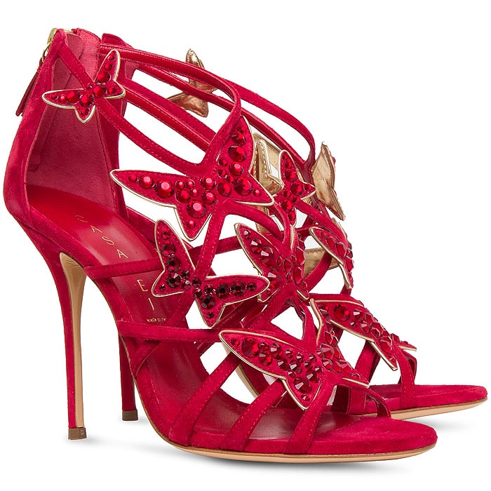 In vivid red suede, the Swarovski-studded butterfly sandals deliver maximum impact, with crystal embellishments catching the light against the bold, saturated color