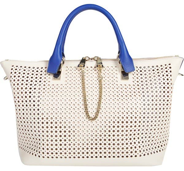 Carry a convenient, convertible tote in hand, the crook of your elbow, or slung over your shoulder