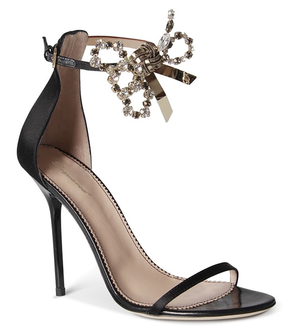 What makes them striking are the rhinestone-embellished bows at the ankles