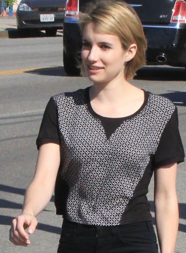 Emma Roberts wearing a graphic mixed media crop top by AQUA