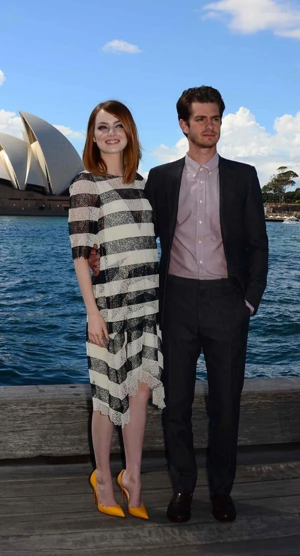Despite Emma Stone's 4-inch yellow Louboutin heels, Andrew Garfield remains taller at the 'The Amazing Spiderman 2' photo call in Sydney