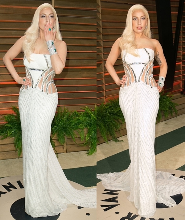 Lady Gaga blows kisses from the Vanity Fair Oscars Party in a strapless white floor-length Atelier Versace gown