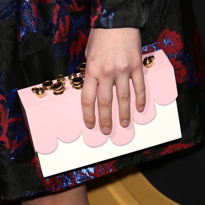 Malina Weissman's quirky white and pink box clutch