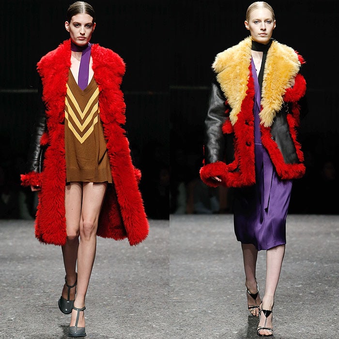 Rihanna's chevron-striped sweater dress and black-red-and-yellow shearling coat on the Prada Fall 2014 catwalk presented during Milan Fashion Week Womenswear Fall/Winter 2014–2015 in Milan, Italy, on February 20, 2014