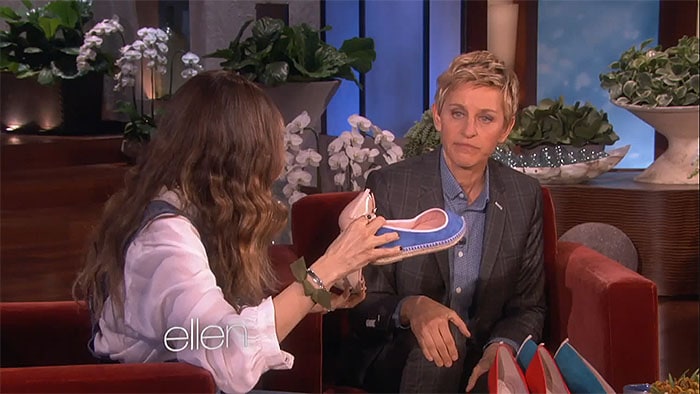 Sarah Jessica Parker shows off a blue SJP by Sarah Jessica Parker pump while appearing on The Ellen DeGeneres Show to promote her footwear collection