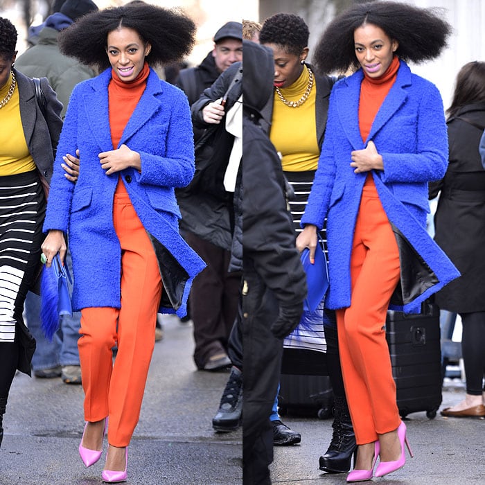 Solange Knowles turned heads while departing the Milly show during Mercedes-Benz Fashion Week Fall 2014 in New York City on February 10, 2014, mixing saturated color with ease by pairing bubblegum-pink pumps with vibrant separates and a textured cobalt coat