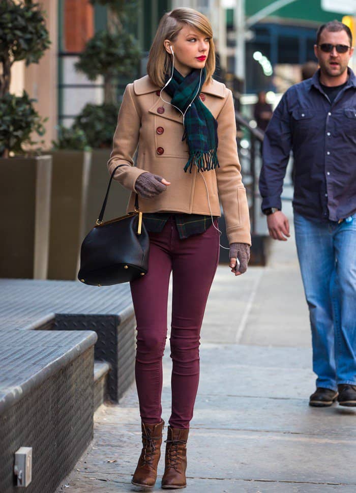 Taylor Swift in a cropped camel peacoat from Ulla Johnson’s Fall 2011 collection shops at the Steven Alan store in New York City