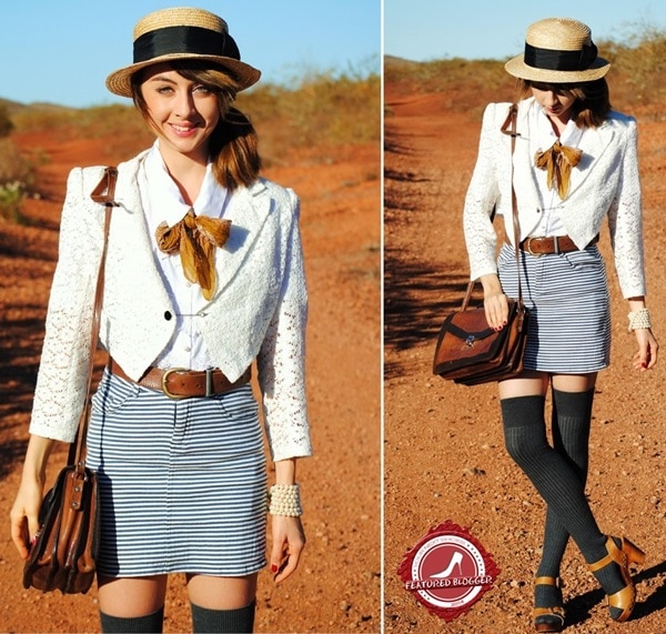 Autilia Antonucci giving her tailored outfit a casual spin by pairing it with gray over-the-knee socks and brown platform sandals