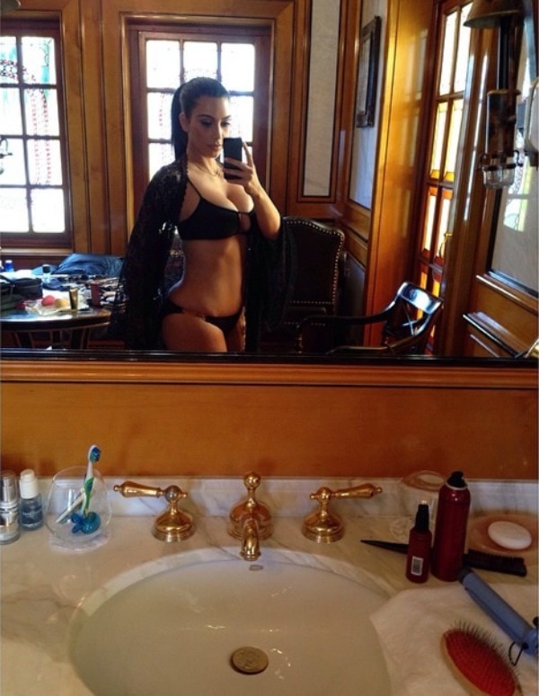 Kim Kardashian’s Instagram photo captioned “Yep stole Kylie’s bikini...she’s not getting it back,” posted on March 13, 2014, shows her confidently rocking her younger sister’s strappy black bikini—proving that style knows no age when it comes to a great fit