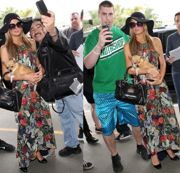 Paris Hilton wore a sleeveless Alice + Olivia “Wheaton” maxi dress featuring a romantic floral print, crinkle-pleated skirt, and high-low hemline—perfectly paired with black Prada pumps crafted in glossy patent leather with sleek silver stiletto heels