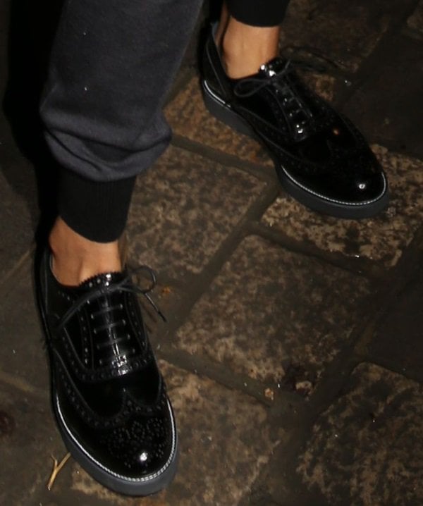 Rihanna styled in masculine brogues for the Lanvin show