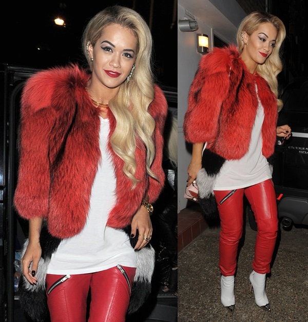 Rita Ora rocks a vibrant red fur coat paired with matching leather pants and white Christian Louboutin ankle boots in London
