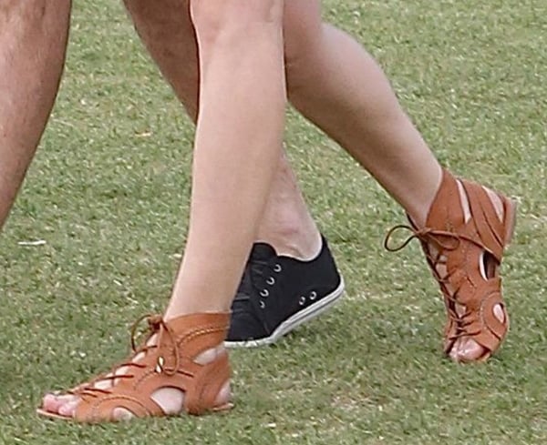 A closer look at Diane Kruger’s Joie “Toledo” sandals reveals the intricate lace-up front and cutout panels that define their bohemian appeal