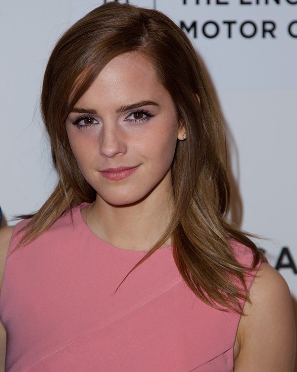 Emma Watson's auburn mane fell softly down her shoulders