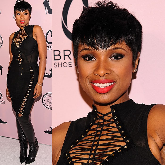 Jennifer Hudson embraced an edgy, rock-inspired aesthetic in a lace-up Agent Provocateur dress and black leather Via Spiga “Femke” over-the-knee boots at the Brown Shoe Company’s 100th anniversary celebration on April 23, 2014, in New York City