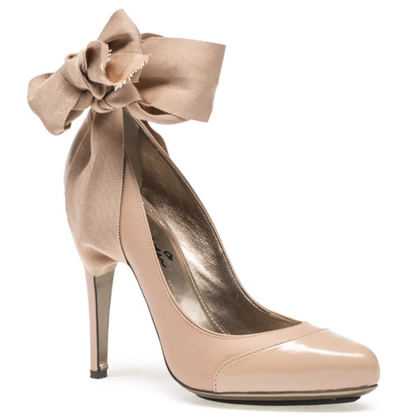 In a softer take, the nude Lanvin ankle-strap pumps feature the same elegant silhouette with a delicate bow-tied ribbon and sleek stiletto heel, also priced at $1,150