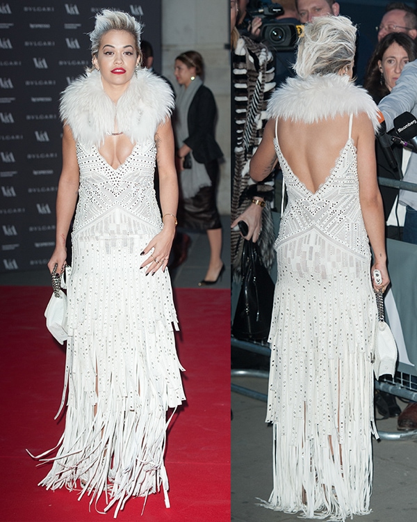 Rita Ora showing off her sprayed white hair while in a Roberto Cavalli dress at the preview of "The Glamour of Italian Fashion" exhibition