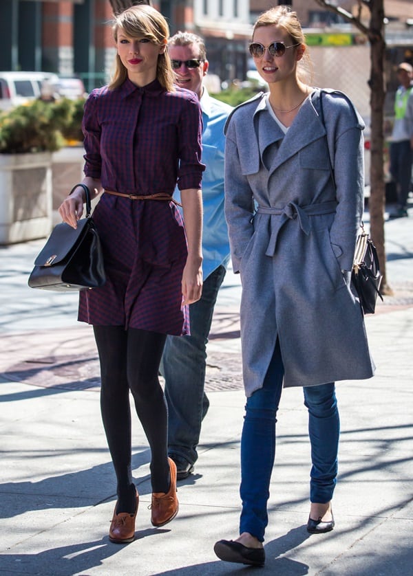 Taylor Swift wore a red-and-blue collared mini dress and Karlie Kloss a gray trench coat and skinny jeans
